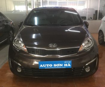 Kia Rio 1.4 AT 2015 - Bán xe Kia Rio 1.4 AT năm sản xuất 2015, màu nâu giá cạnh tranh