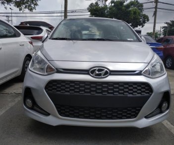 Hyundai Grand i10 1.2MT 2018 - Thanh lý Hyundai Grand I10 1.2MT HB số sàn, màu bạc, trả trước 122 triệu, bao hồ sơ