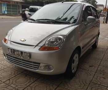 Chevrolet Spark 2015 - Cần bán gấp Chevrolet Spark sản xuất 2015, màu bạc