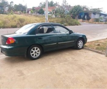 Kia Spectra   2000 - Cần bán gấp Kia Spectra 2000, màu xanh lục