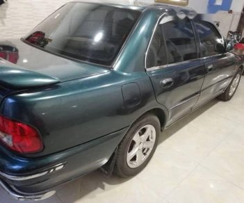 Proton Wira   1998 - Cần bán lại xe Proton Wira đời 1998, màu xanh lục, nhập khẩu nguyên chiếc như mới, 125 triệu