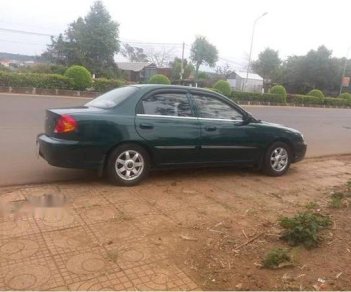 Kia Spectra   2000 - Cần bán gấp Kia Spectra 2000, màu xanh lục