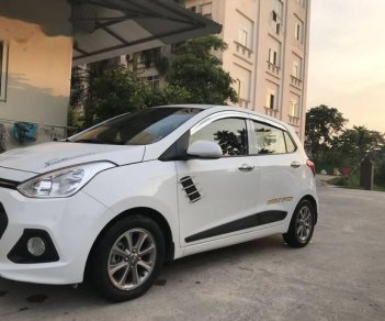 Hyundai Grand i10 2015 - Cần bán xe Hyundai Grand i10 sản xuất 2015, màu trắng, nhập khẩu nguyên chiếc chính chủ