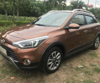 Hyundai i20 Active 1.4 AT 2WD 2016 - Cần bán Hyundai i20 Active nhập khẩu 2016, màu nâu đi mới 18.000km