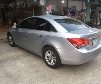 Chevrolet Cruze LS 2015 - Bán xe Chevrolet Cruze LS 2015, màu bạc xe gia đình