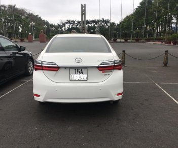 Toyota Corolla altis E CVT 2018 - Cần bán gấp Toyota Corolla Altis E CVT đời 2018, màu trắng số tự động, giá 725tr