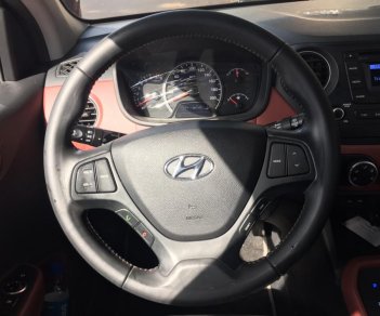 Hyundai Grand i10 2014 - Cần bán xe Hyundai Grand i10 năm sản xuất 2014, màu trắng, nhập khẩu nguyên chiếc