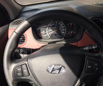 Hyundai Grand i10 2014 - Cần bán xe Hyundai Grand i10 năm sản xuất 2014, màu trắng, nhập khẩu nguyên chiếc