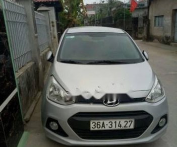 Hyundai Grand i10 2015 - Bán Hyundai Grand i10 năm sản xuất 2015, màu bạc