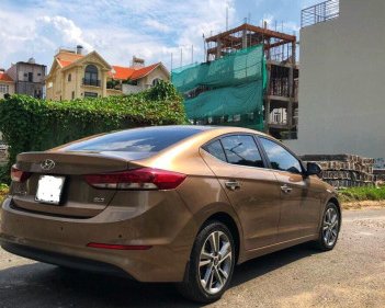 Hyundai Elantra  2.0 AT  2016 - Bán Hyundai Elantra 2.0 AT đời 2016, màu nâu  