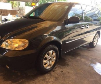 Kia Carnival 2009 - Cần bán gấp Kia Carnival năm sản xuất 2009, màu đen 