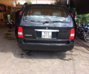 Kia Carnival 2009 - Cần bán gấp Kia Carnival năm sản xuất 2009, màu đen 