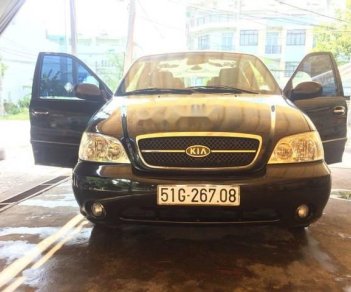 Kia Carnival 2009 - Cần bán gấp Kia Carnival năm sản xuất 2009, màu đen 