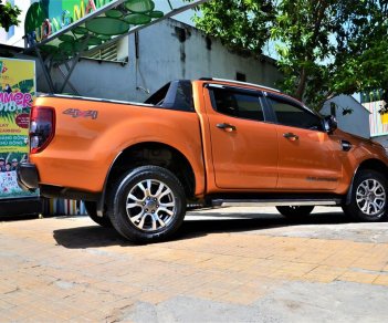 Ford Ranger  Wildtrak 3.2 AT 4x4 2017 - Bán Ford Ranger Wildtrak 3.2 AT 4x4 sản xuất 2017 màu vàng cam, biển Hà Nội