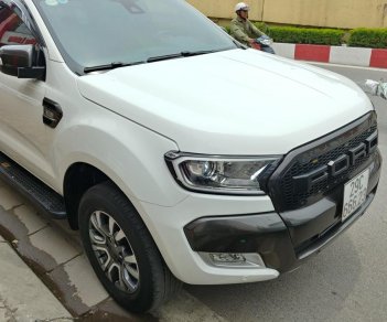 Ford Ranger 3.2L Wildtrak 4x4 AT 2016 - Cần bán xe Ford Ranger 3.2L Wildtrak 4x4 AT đời 2016, màu trắng, nhập khẩu nguyên chiếc