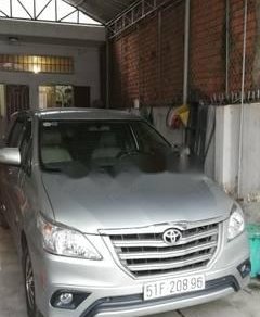 Toyota Innova 2015 - Cần bán lại xe Toyota Innova 2015, màu bạc chính chủ, 592 triệu