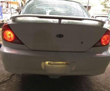 Kia Spectra 2004 - Cần bán gấp Kia Spectra 2004, màu trắng, giá tốt