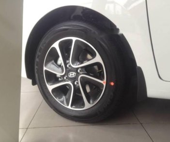 Hyundai Grand i10   1.2MT 2018 - Bán ô tô Hyundai Grand i10 1.2MT đời 2018, màu trắng, giá tốt