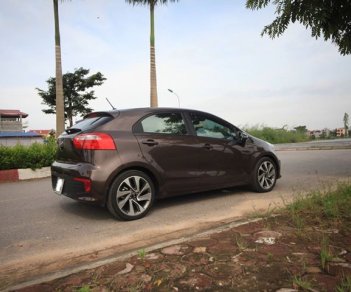 Kia Rio 1.4 GAT 2016 - Bán Kia Rio Hatchback 2016 tự động, màu nâu, xe zin nguyên bản đẹp