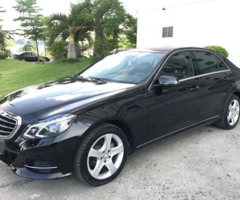 Mercedes-Benz E class E200 2014 - Bán xe Mercedes E200 sản xuất 2014, màu đen một chủ mua mới