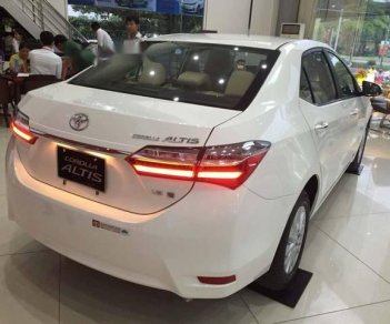 Toyota Corolla altis 1.8E CVT 2018 - Bán ô tô Toyota Corolla Altis 1.8E CVT sản xuất 2018, màu trắng, giá 707tr