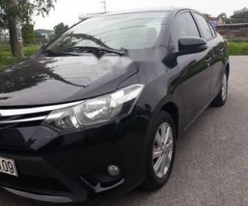 Toyota Vios E 2014 - Cần bán lại xe Toyota Vios E đời 2014, màu đen như mới