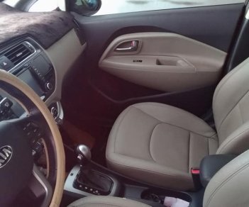 Kia Rio 1.4 GAT 2016 - Bán Kia Rio Hatchback 2016 tự động, màu nâu, xe zin nguyên bản đẹp