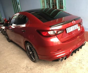 Mazda 2 1.5AT   2016 - Bán Mazda 2 sedan 1.5AT màu đỏ đô số tự động sản xuất 2016 biển Sài Gòn lăn bánh 32000km