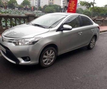 Toyota Vios   E  2015 - Cần bán gấp Toyota Vios E năm 2015, màu bạc, giá tốt