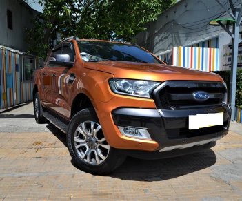 Ford Ranger  Wildtrak 3.2 AT 4x4 2017 - Bán Ford Ranger Wildtrak 3.2 AT 4x4 sản xuất 2017 màu vàng cam, biển Hà Nội