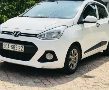 Hyundai Grand i10 1.2AT 2015 - Hyunda Grand i10 đời 2015, màu trắng, nhập khẩu nguyên chiếc