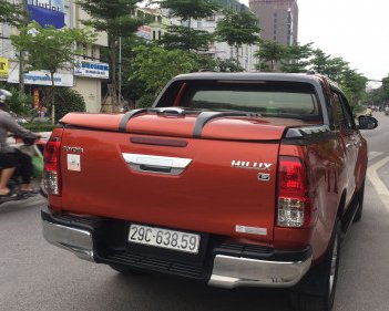 Toyota Hilux  G 3.0AT 4x4 2015 - Bán xe Toyota Hilux G 3.0AT 4x4 đời 2015, màu đỏ 