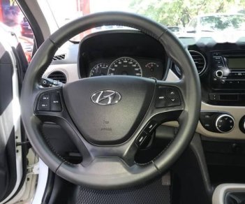 Hyundai i10 2015 - Cần bán Hyundai i10 sản xuất năm 2015, màu trắng, 320 triệu