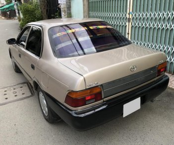 Toyota Corolla 1.6MT 1994 - Bán xe Toyota Corolla 1.6MT sản xuất 1994, đăng kí 1996 màu đồng