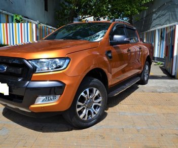 Ford Ranger  Wildtrak 3.2 AT 4x4 2017 - Bán Ford Ranger Wildtrak 3.2 AT 4x4 sản xuất 2017 màu vàng cam, biển Hà Nội