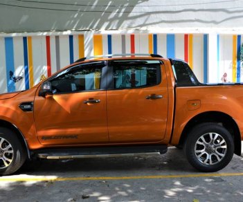 Ford Ranger  Wildtrak 3.2 AT 4x4 2017 - Bán Ford Ranger Wildtrak 3.2 AT 4x4 sản xuất 2017 màu vàng cam, biển Hà Nội