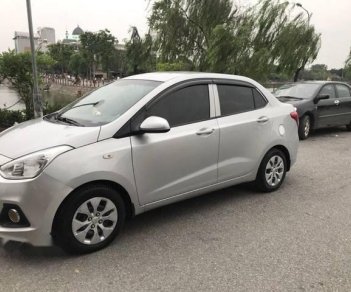 Hyundai Grand i10 2015 - Cần bán gấp Hyundai Grand i10 đời 2015, màu bạc, giá 328tr