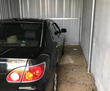 Toyota Corolla altis G 2004 - Cần bán xe Toyota Corolla altis G sản xuất năm 2004, màu đen, xe nhập