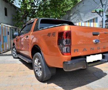 Ford Ranger  Wildtrak 3.2 AT 4x4 2017 - Bán Ford Ranger Wildtrak 3.2 AT 4x4 sản xuất 2017 màu vàng cam, biển Hà Nội