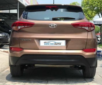 Hyundai Tucson   2.0 AT  2015 - Bán Hyundai Tucson 2.0 AT năm sản xuất 2015, màu nâu, giá chỉ 850 triệu