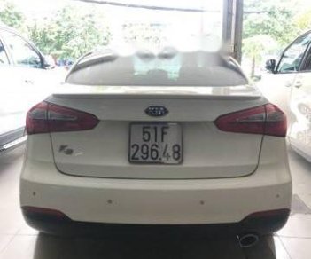 Kia K3 1.6AT 2015 - Cần bán xe Kia K3 1.6AT sản xuất 2015, màu trắng xe gia đình