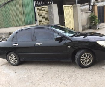 Mitsubishi Lancer 1.8AT 2003 - Bán xe Mitsubishi Lacer 1.8 AT 2003 màu đen