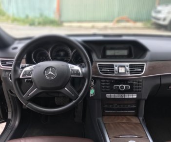 Mercedes-Benz E class E200 2014 - Bán xe Mercedes E200 sản xuất 2014, màu đen một chủ mua mới