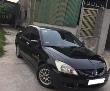 Mitsubishi Lancer 1.8 AT 2003 - Bán Mitsubishi Lancer 1.8 AT 2003 màu đen, odo 108.000 Km