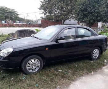 Daewoo Nubira 2002 - Bán Daewoo Nubira đời 2002, màu đen còn mới, giá 95tr