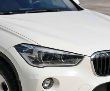 BMW X1   sDrive20i  2016 - Cần bán xe BMW X1 sDrive20i sản xuất năm 2016, màu trắng, giá tốt