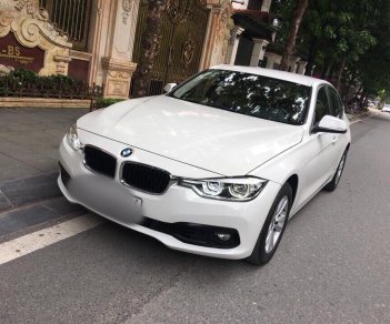 BMW 3 Series 320i 2016 - Cần bán gấp BMW 320i năm 2016, màu trắng