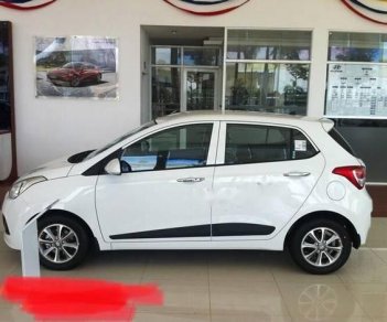 Hyundai Grand i10  1.2AT 2015 - Cần bán lại xe Hyundai Grand i10 đời 2015, màu trắng chính chủ