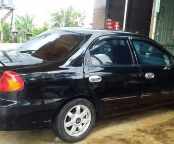 Kia Spectra   2004 - Cần bán lại xe Kia Spectra 2004, màu đen