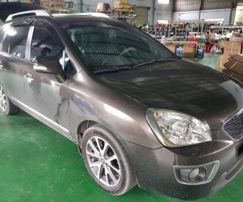 Kia Carens S 2.0MT  2015 - Bán Kia Carens S 2.0MT màu nâu titan, số sàn, sản xuất 2015, biển Sài Gòn